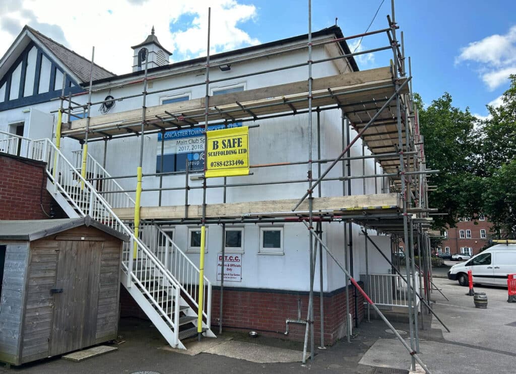 BSafe Construction scaffolding with safety mesh on a cricket club renovation in progress